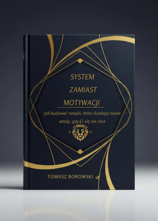 Czarna książka "System zamiast motywacji" z złotymi zdobieniami i lwem na okładce, poradnik o budowaniu nawyków